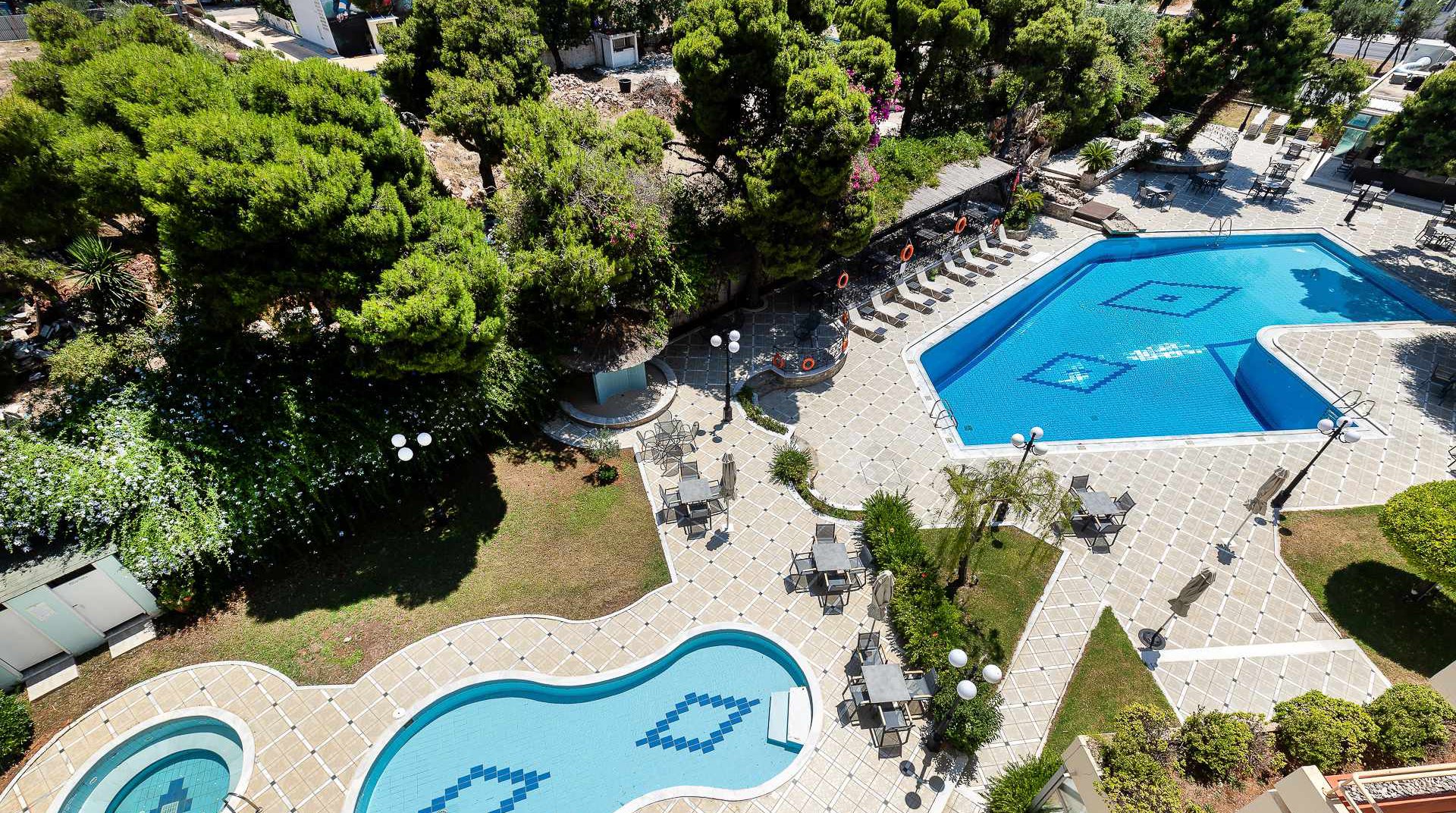Our hotel from distance, with the pool, the childrens pool and the jacuzzi