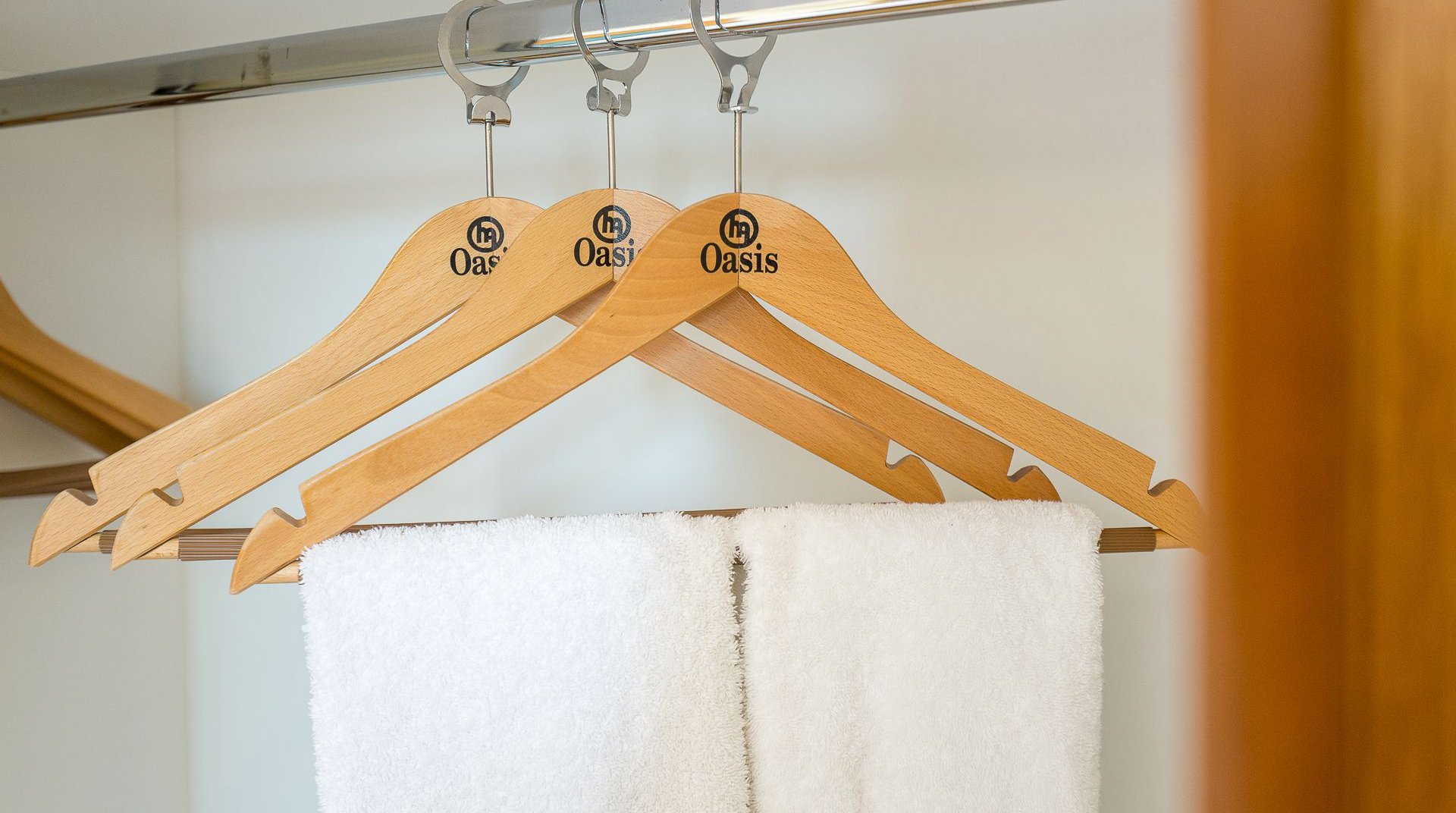 The hangers of our rooms with our logo